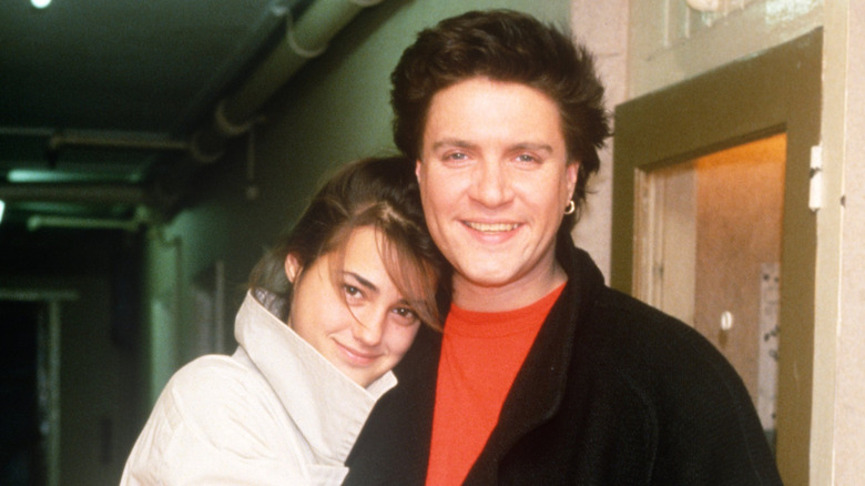 Simon Le Bon and Yasmin Parvaneh hug in 1985