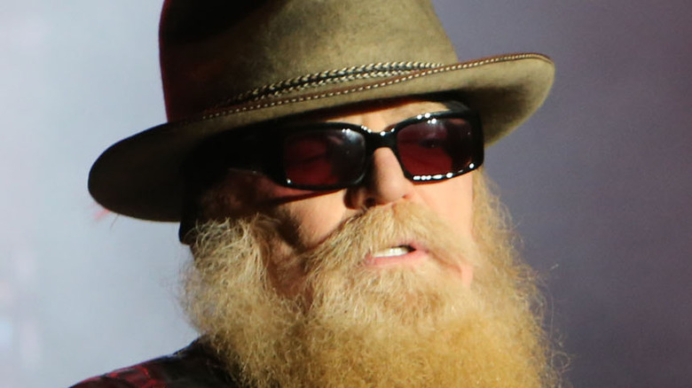 Dusty Hill performs on stage