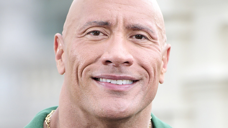 Dwayne Johnson clean shaven smiling