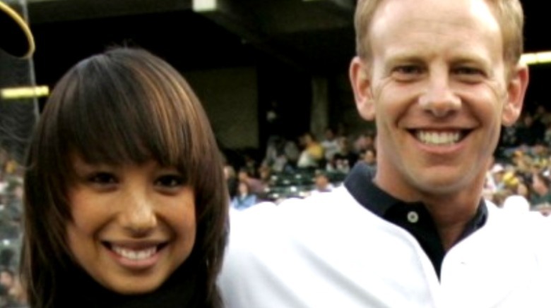 Cheryl Burke and Ian Ziering on the baseball field