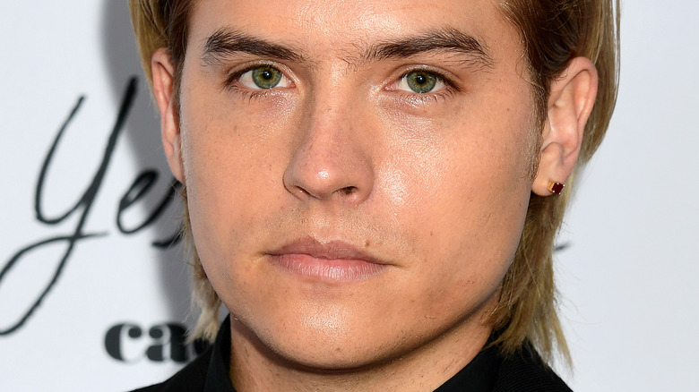 Dylan Sprouse looking at camera