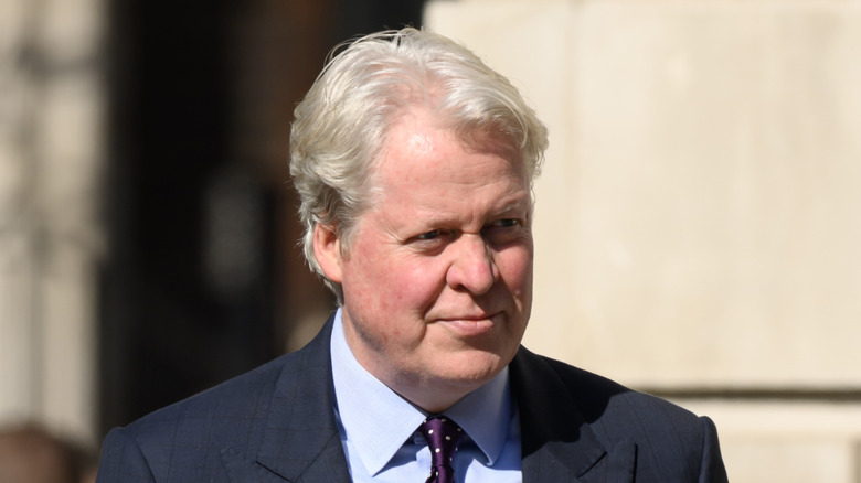 Charles Spencer walks outdoors in 2024