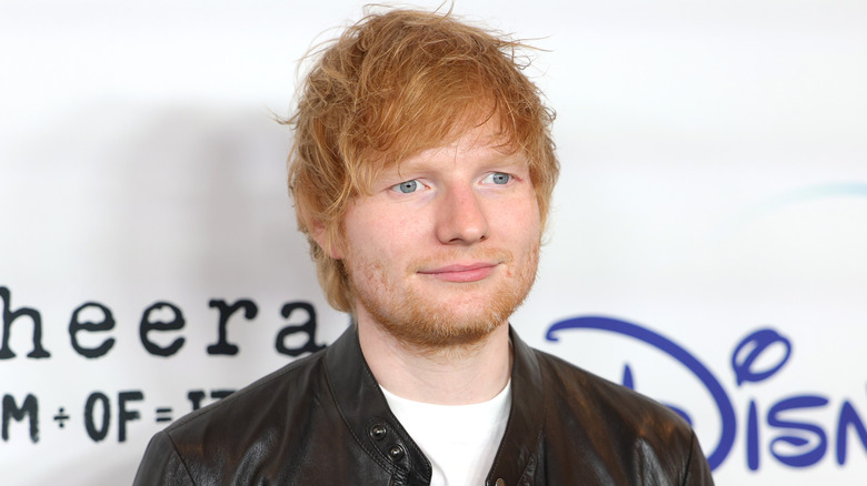 Ed Sheeran posing on red carpet