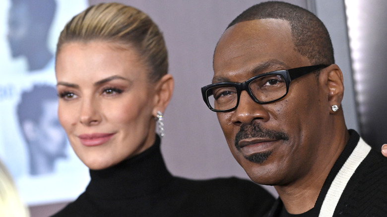 Paige Butcher and Eddie Murphy posing