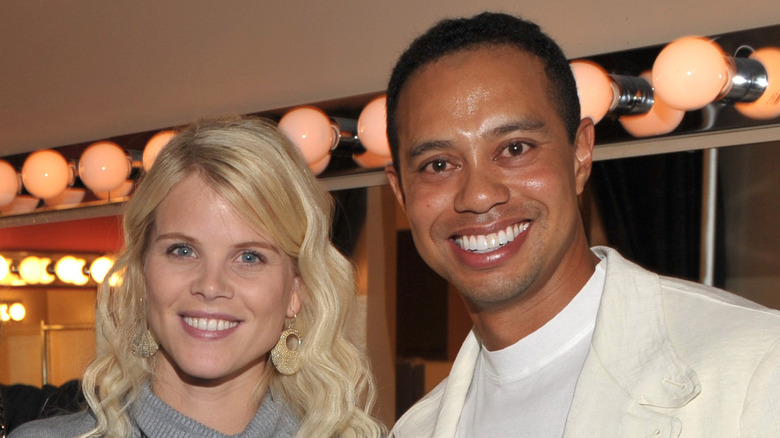 Elin Nordegren and Tiger Woods pose together