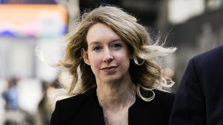 Elizabeth Holmes walking outside court