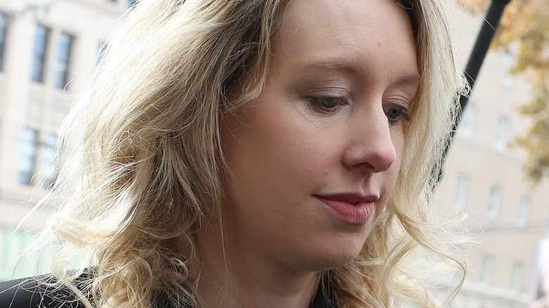 Elizabeth Holmes walking into court