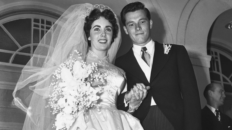 Elizabeth Taylor with Conrad Nicky Hilton Jr. on their wedding day.