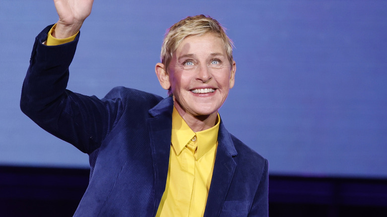 Ellen Degeneres waving on stage