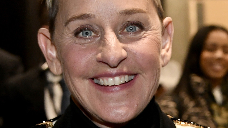 Ellen DeGeneres smiles at an event