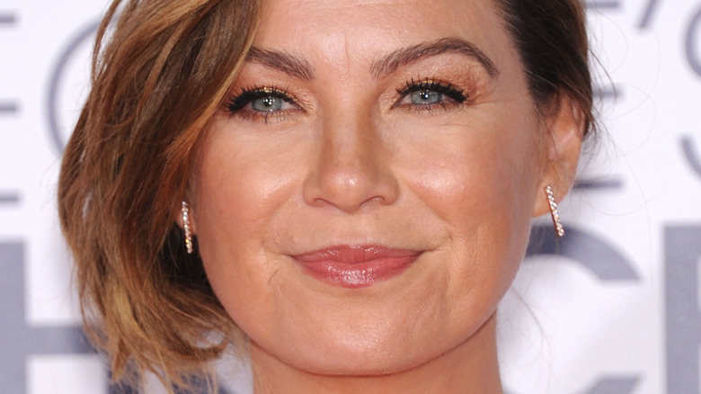 Ellen Pompeo poses with hair swept to the right