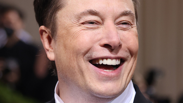 Elon Musk laughing