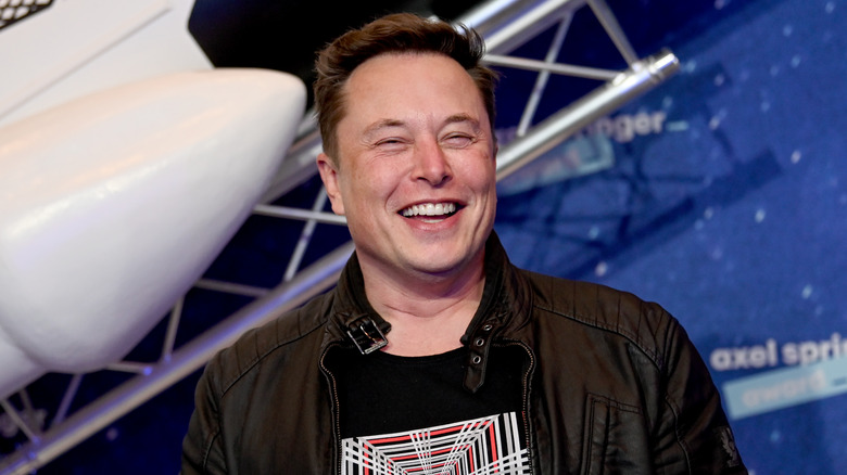 Elon Musk laughing