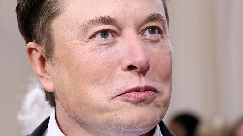 Elon Musk looking up