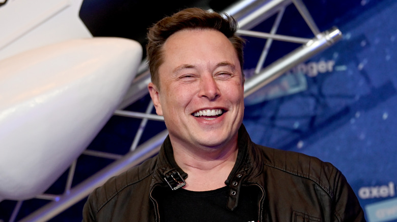 Elon Musk laughing 