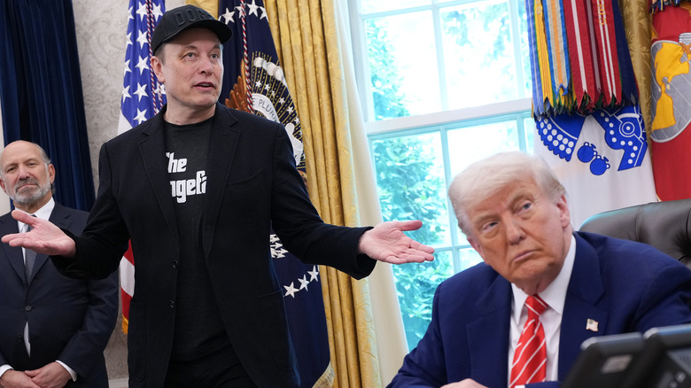 Elon Musk and Donald Trump speaking in the Oval Office