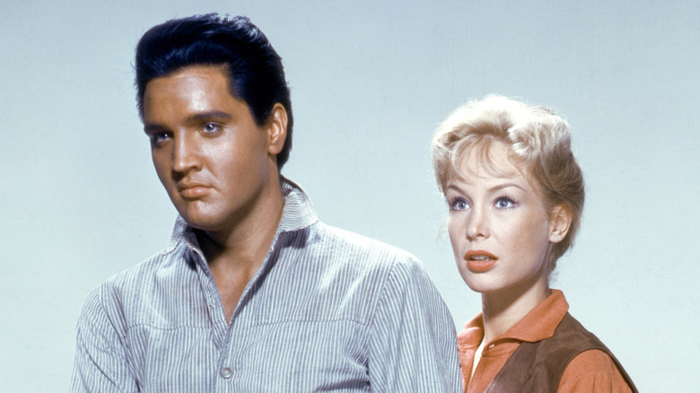 Elvis Presley and Barbara Eden star in Flaming Star