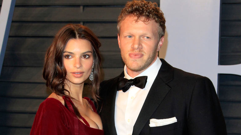 Emily Ratajkowski and Sebastian Bear-McClard posing