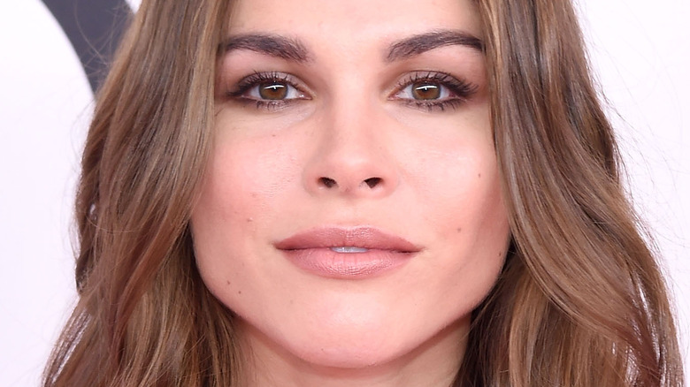 Emily Weiss subtle smile