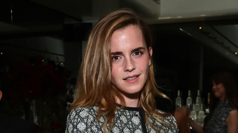 Emma Watson poses at an event