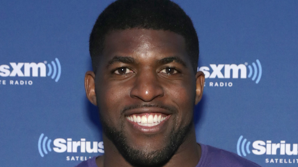 Emmanuel Acho smiles 