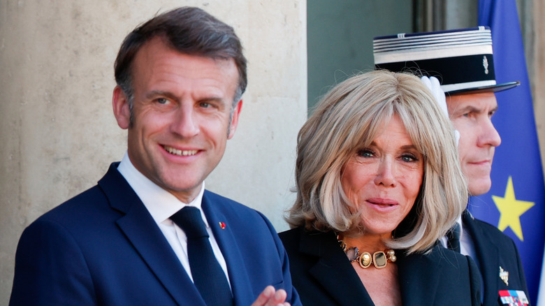 Emmanuel Macron Brigitte Macron smiling