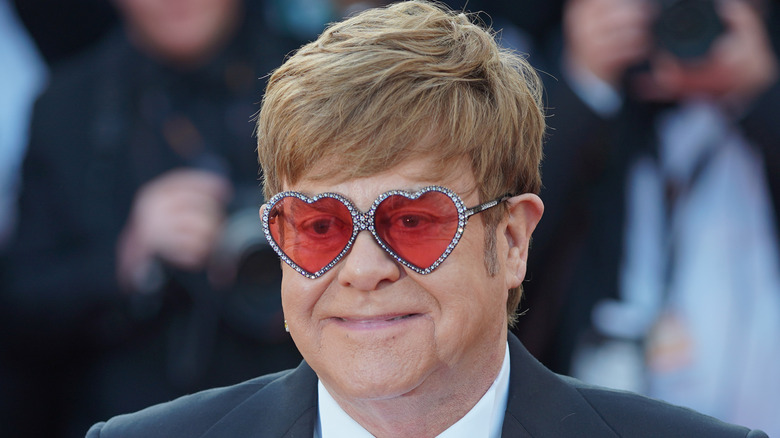 Elton John poses for a photo