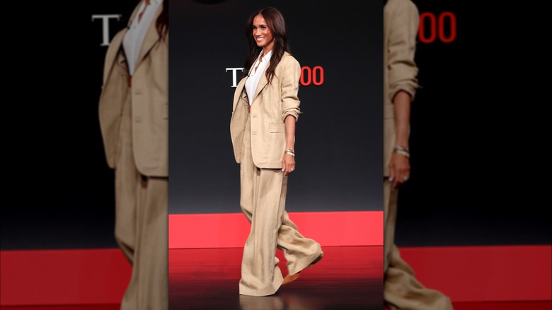 Meghan Markle in wide trousers at Times 100 event.
