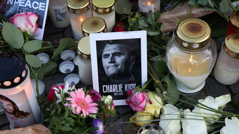 Makeshift memorial for Charlie Kirk with flowers and candles