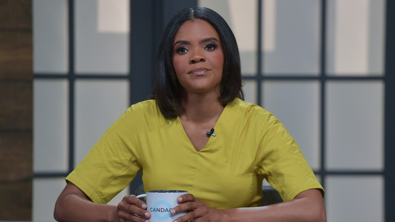 Candace Owens sitting at a desk