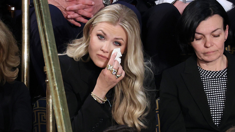 Erika Kirk dabs away tears at the 2026 State of the Union in a black outfit