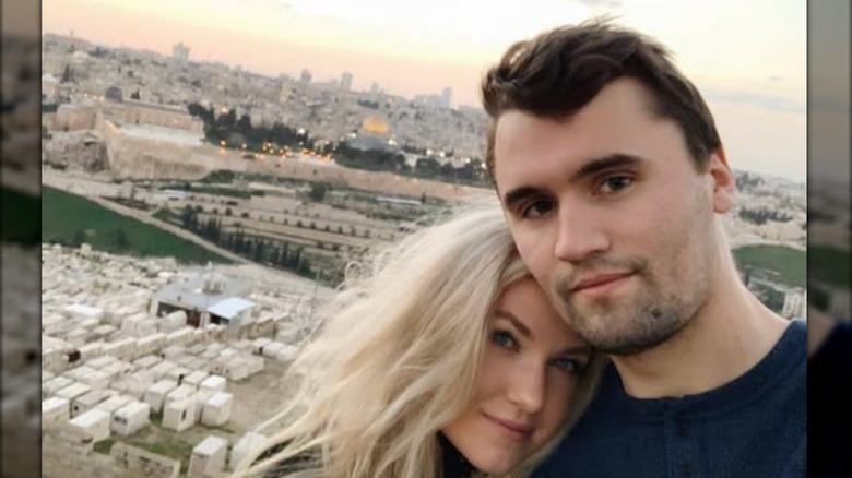 Erika and Charlie Kirk posing together for a selfie.