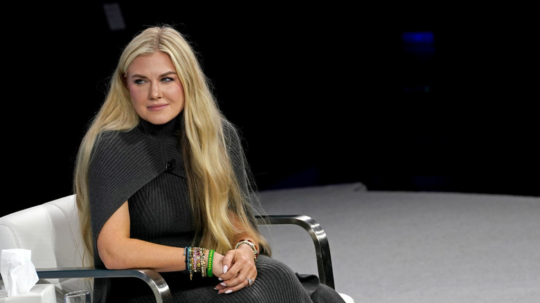 Erika Kirk wears gray dress and bracelets