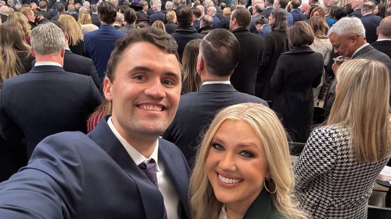 Charlie Kirk and Erika Kirk taking a selfie in the crowd during Donald Trump's second inauguration
