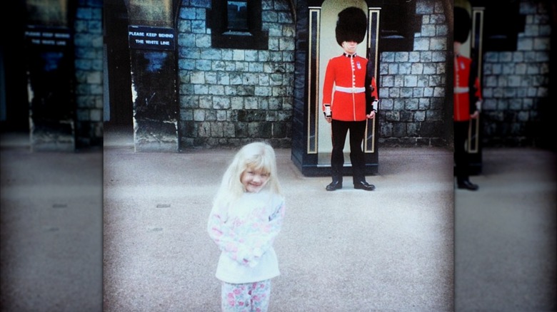 A young Erika Kirk posing while on a trip