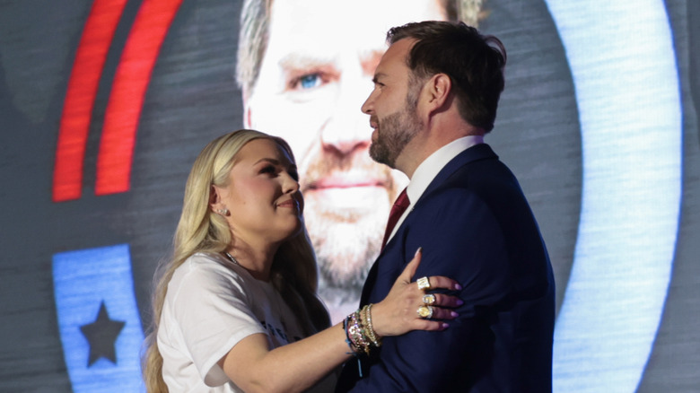 Erika Kirk and JD Vance hug at Turning Point USA event in October 2025