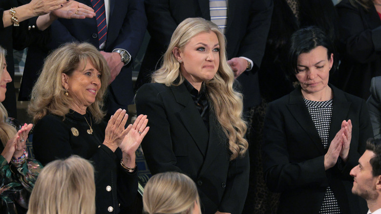 Erika Kirk looking emotional at the 2026 State of the Union in an all-black outfit