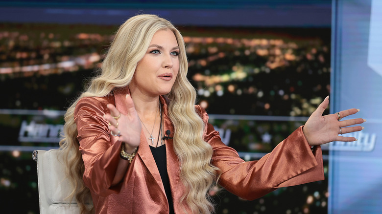 Erika speaking on television