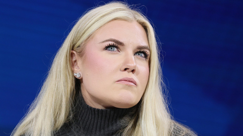 Erika Kirk speaking at a book event