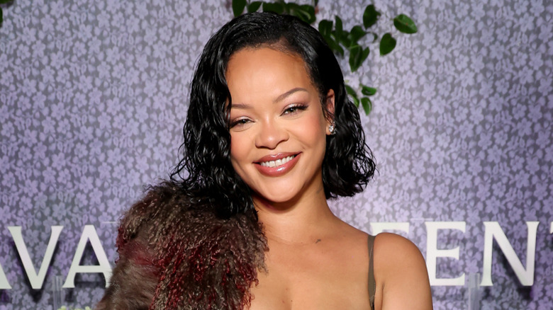 Rihanna smiles with short hairdo in 2024