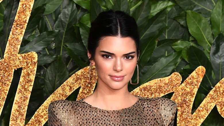 Kendall Jenner with big gold earrings