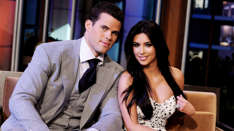 Kris Humphries and Kim Kardashian sitting together