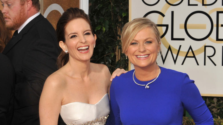 Tina Fey and Amy Poehler pose together at the Golden Globe Awards