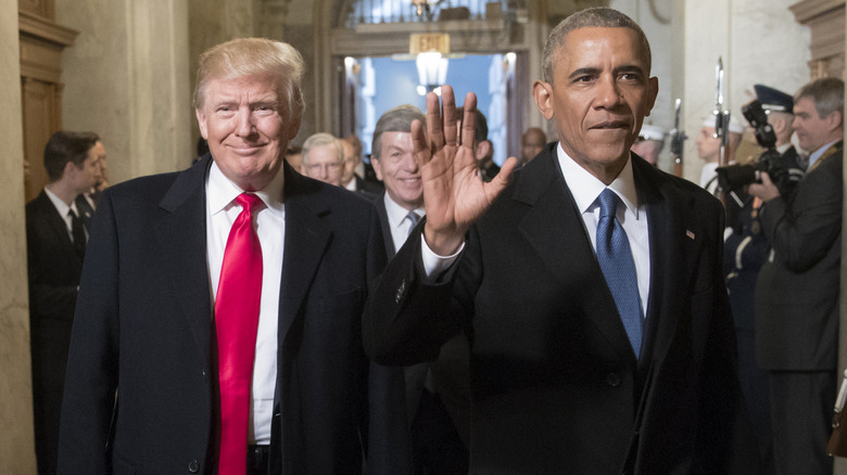Donald Trump, Barack Obama walking down corridor