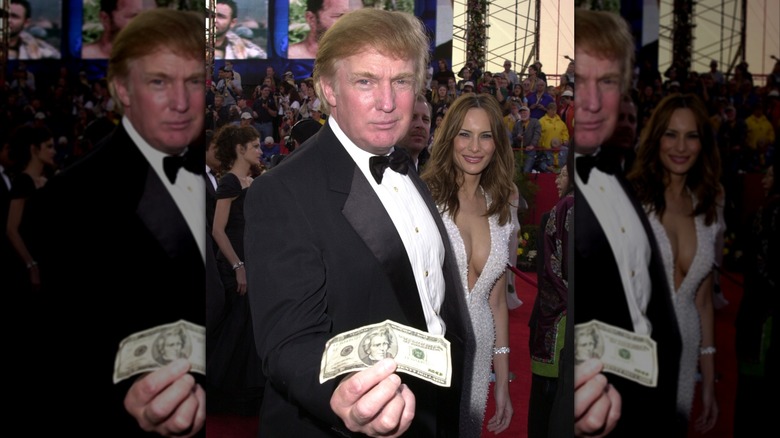 Donald Trump holding money
