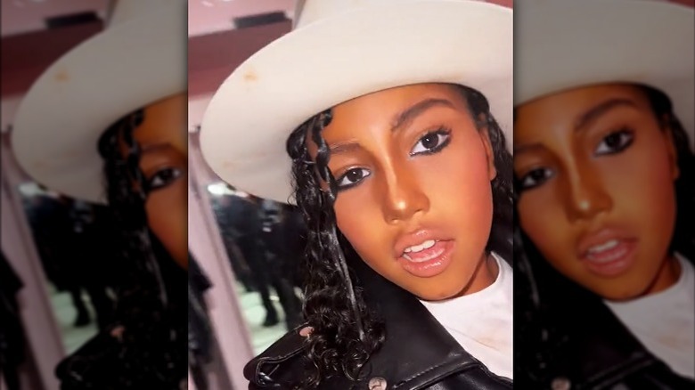 North West wearing fedora