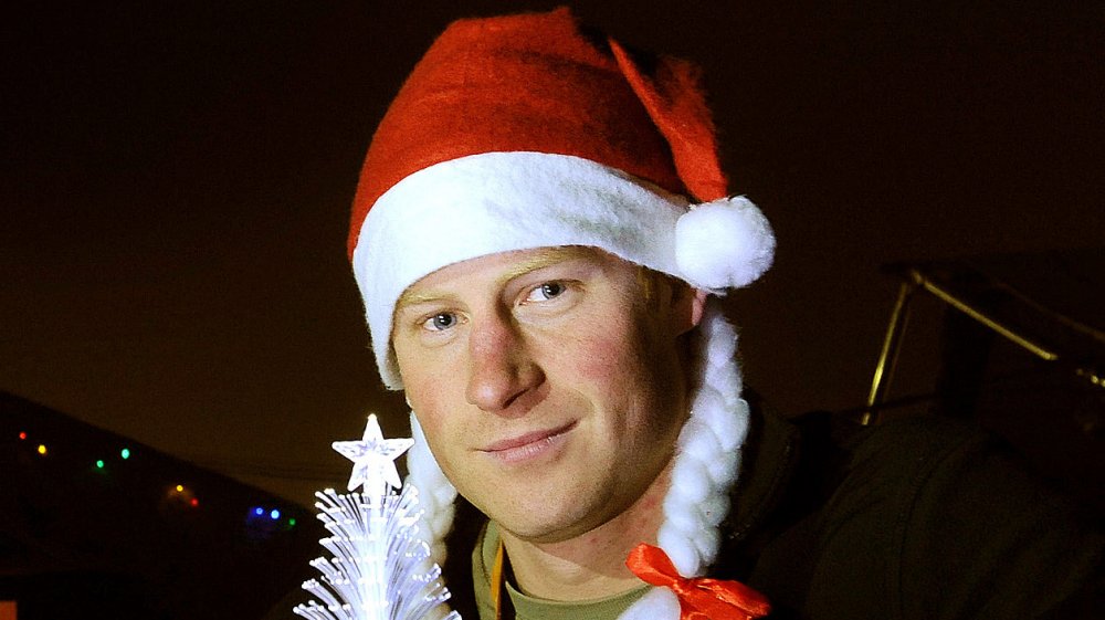 Prince Harry wearing a Santa hat