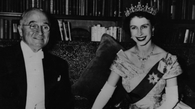 Harry Truman and Queen Elizabeth both smiling