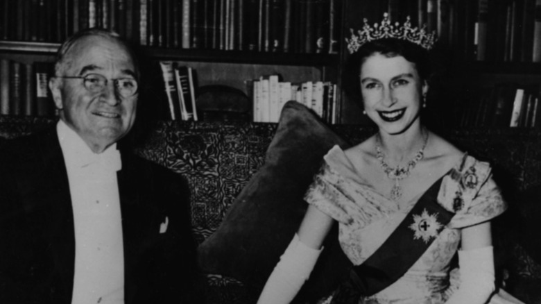 Harry Truman and Queen Elizabeth both smiling