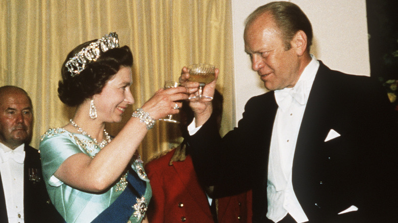 Queen Elizabeth and Gerald Ford, both giving a toast